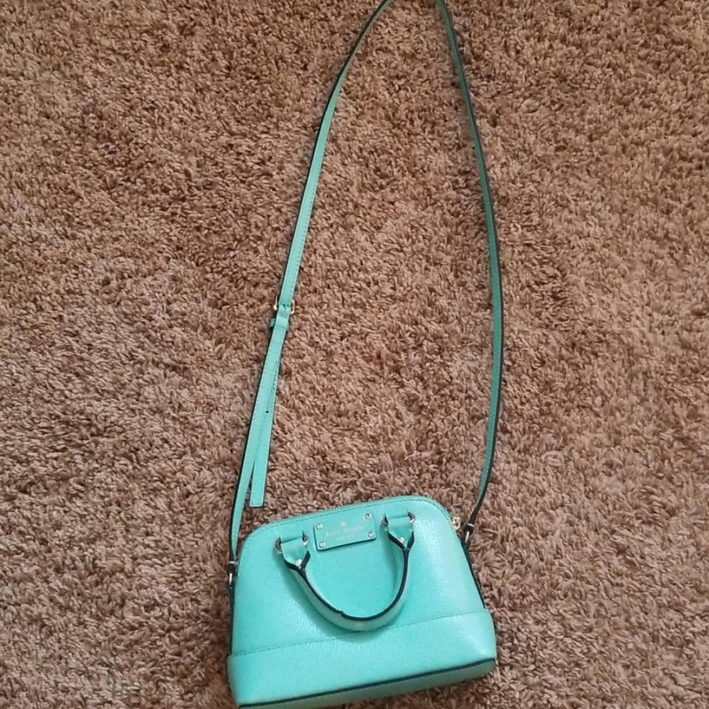Small Kate Spade crossbody purse.